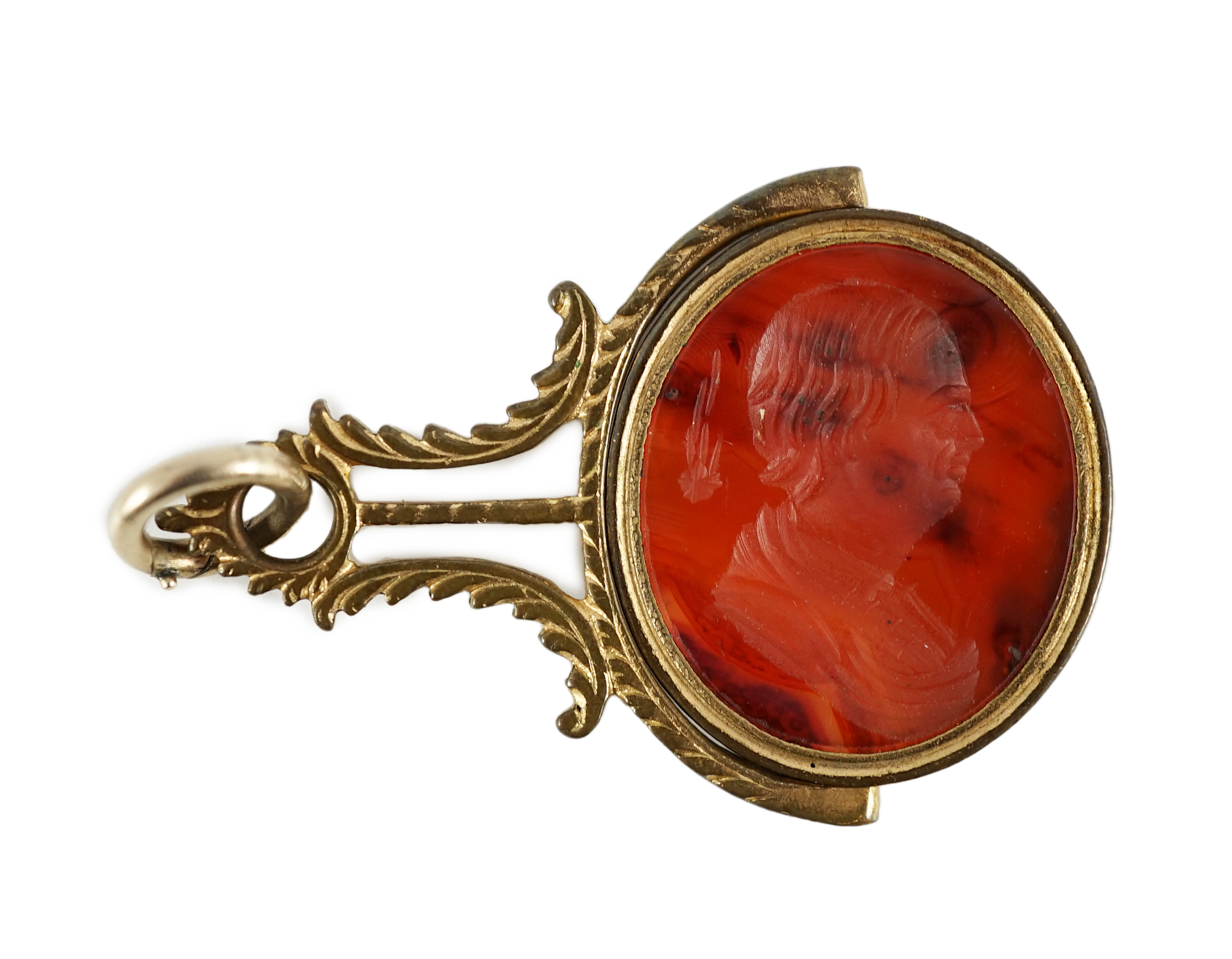 A late 18th/early 19th gilt metal mounted intaglio agate set swivelling fob seal, carved with the bust of Edmond Halley with the comet, 47mm, in original box.